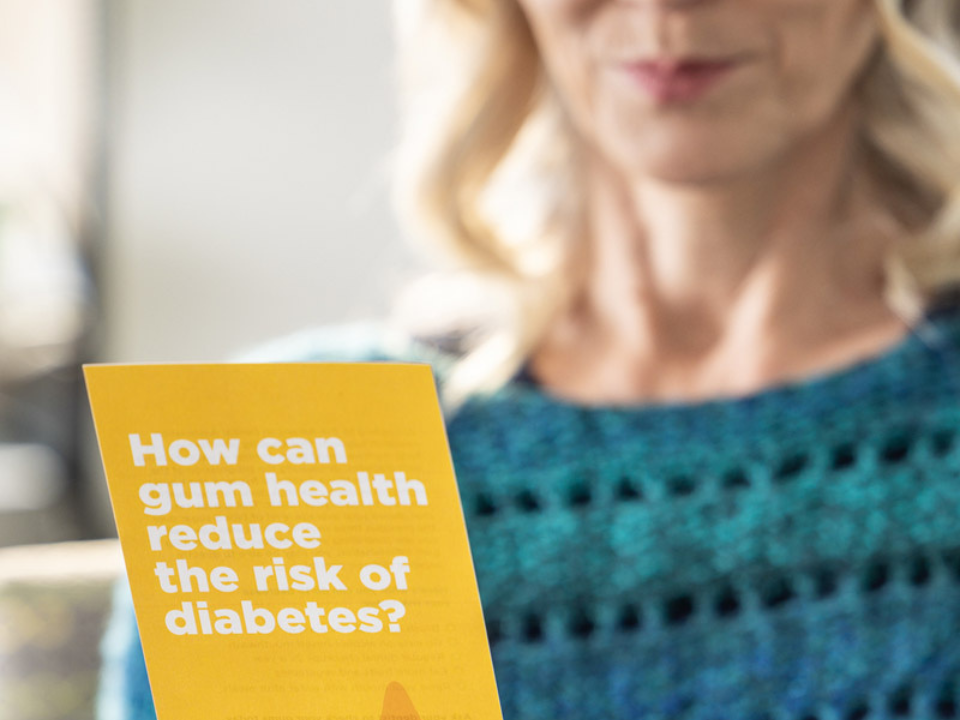 Integrated Health Care image of lady reading a pamphlet