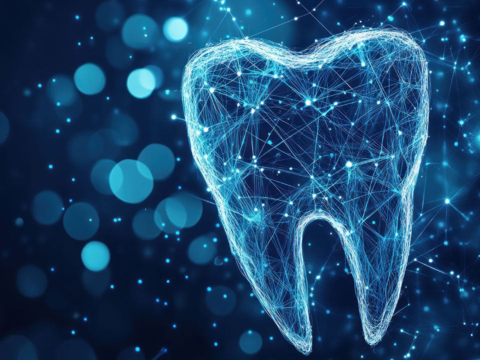 Digital image of a tooth hovering in dark space